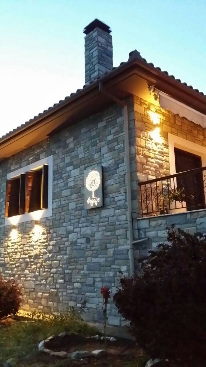 Guest house exterior sign design